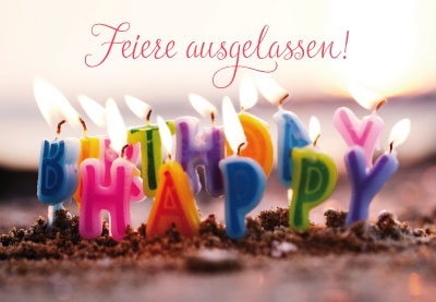 Geburtstag - brennende, bunte Kerzen